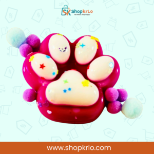 Cute Pink Paw Squishy Toy held in hand showing 5cm x 6cm size