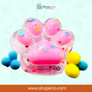dreamy pink squishy paw held in hand to show small size