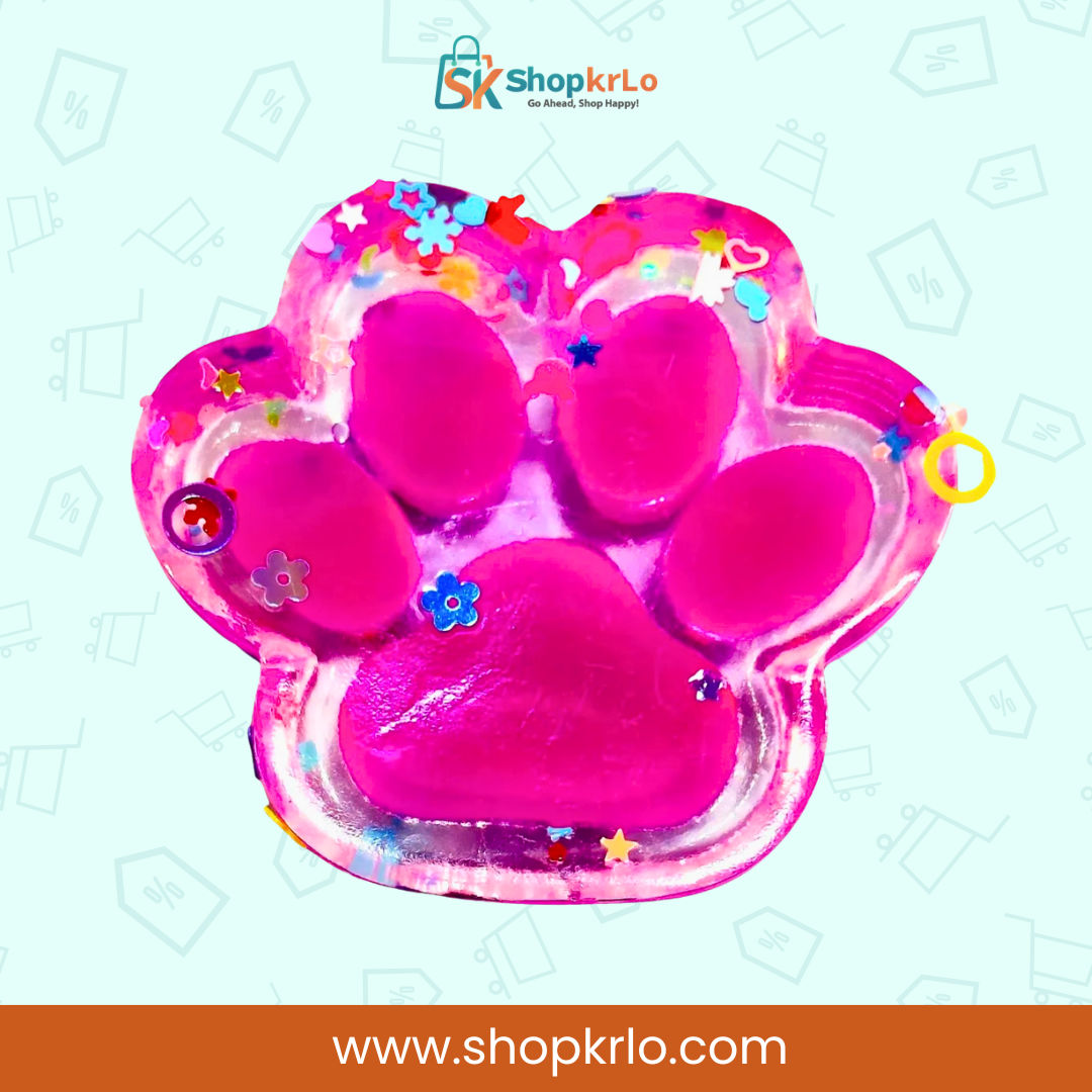 Sparkly paw squishy toy on desk for stress relief breaks