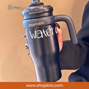 Hand holding black insulated tumbler for convenient daily hydration in Pakistan