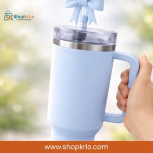 Ice Blue Bow Topper fitted neatly onto a reusable blue tumbler straw
