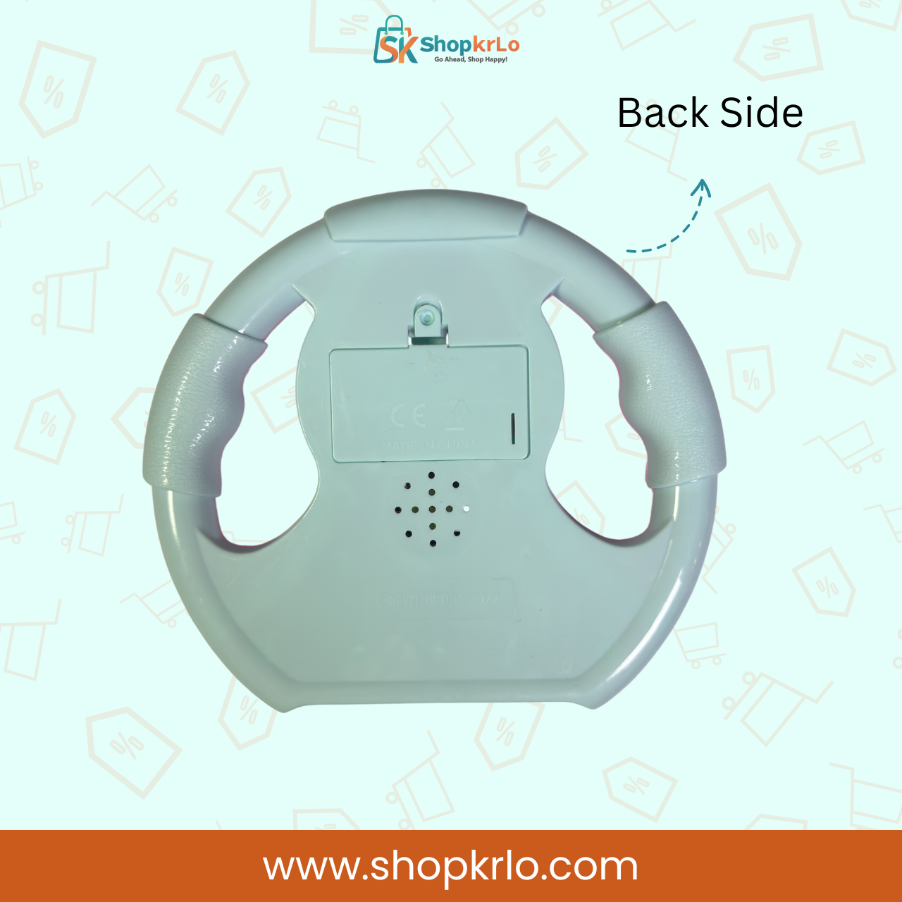Rear view showing Doraemon Musical Piano Toy battery compartment and rounded grip